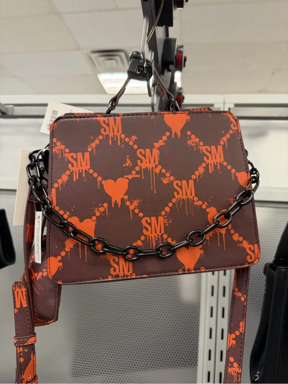 Steve Madden Bleeding Heart Bevln  Crossbody Bag in Brown with Orange Print